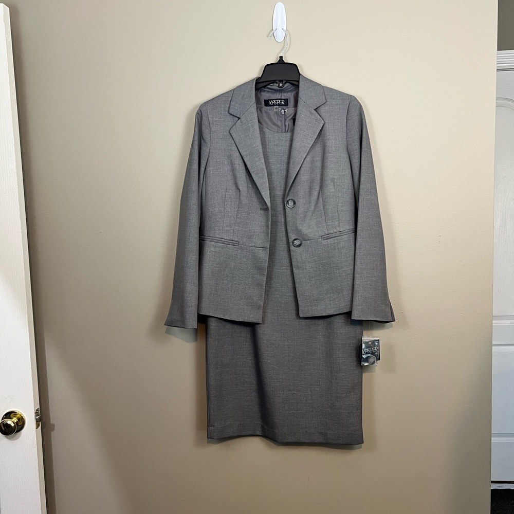 Grey Size 8 suit that’s never been worn.